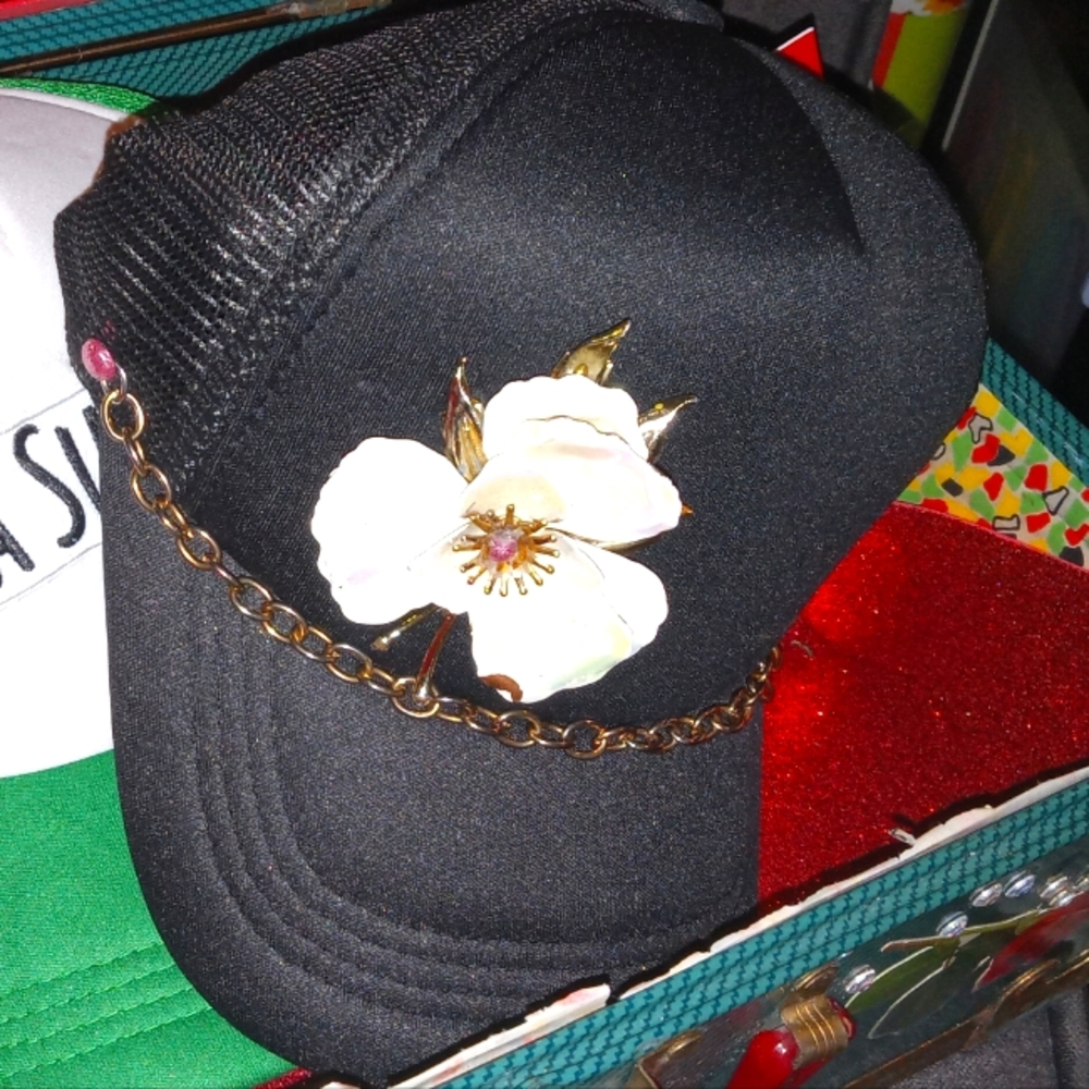 Hand crafted customizable/pre-made hats. Most all pins, chains, jewelry etc are